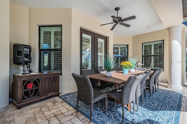 5914 Fitzgerald Rd, Odessa, FL 33556 - dining space featuring ceiling fan, french doors, and ornate columns