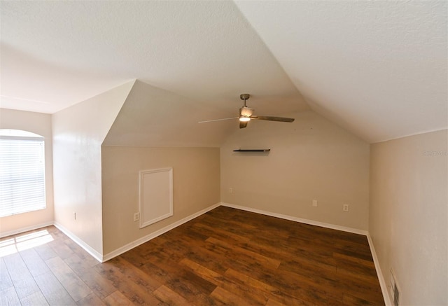 9730 Lake Chase Island Way Unit 9730, Tampa, FL 33626 - additional living space featuring wood finished floors, lofted ceiling, a ceiling fan, and a textured ceiling