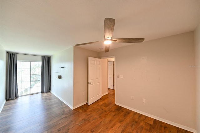 9730 Lake Chase Island Way Unit 9730, Tampa, FL 33626 - empty room with a ceiling fan and wood finished floors