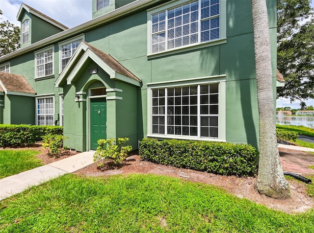 9730 Lake Chase Island Way Unit 9730, Tampa, FL 33626 - view of front of home with stucco siding