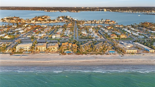 birds eye view of property with a water view and a residential view