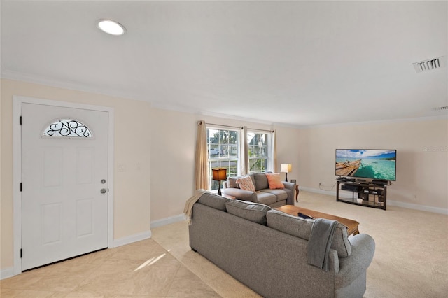 living room featuring ornamental molding, light colored carpet, visible vents, and baseboards