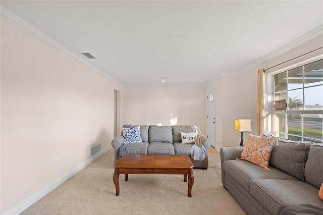 living area with ornamental molding, light colored carpet, visible vents, and baseboards