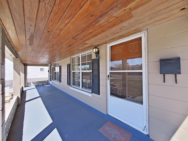 doorway to property featuring a porch