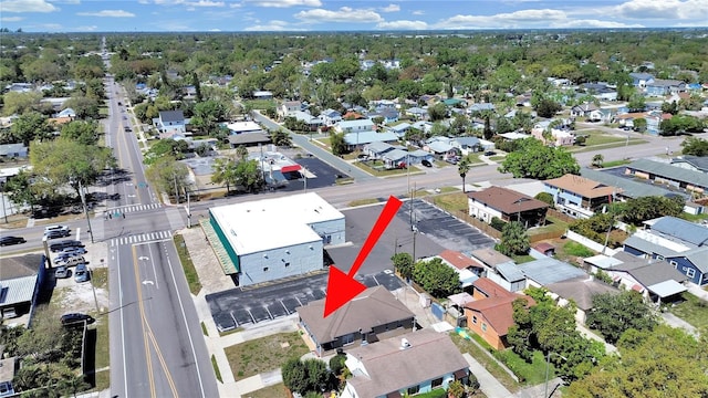 birds eye view of property with a residential view