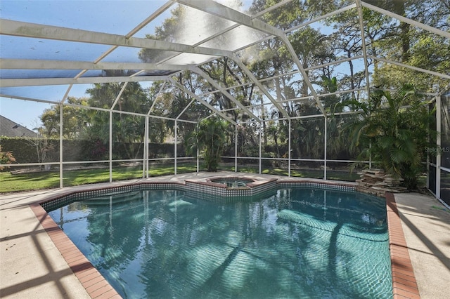 view of swimming pool featuring a lanai, a patio area, and a pool with connected hot tub