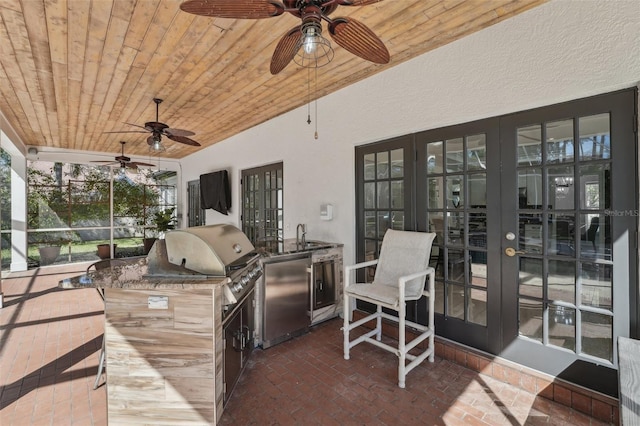 view of patio / terrace with french doors, area for grilling, grilling area, and a ceiling fan