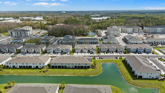 aerial view with a residential view and a water view