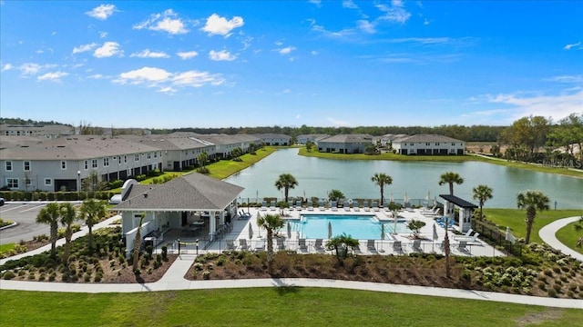 exterior space with a water view and a residential view