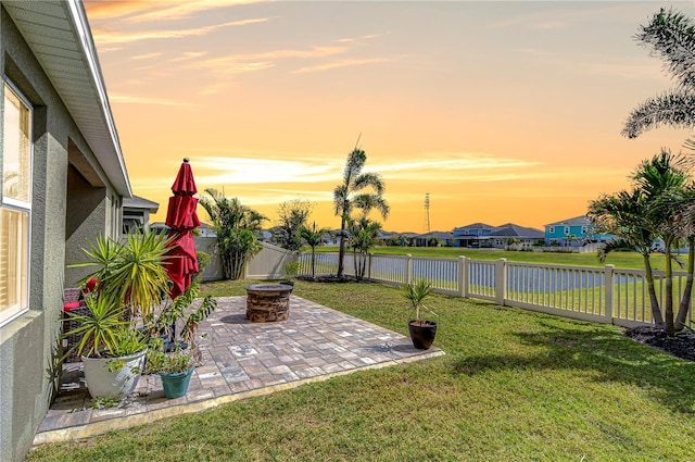 11605 Cleyera Ct, Riverview, FL 33579 - view of yard featuring a patio area, a water view, an outdoor fire pit, and a residential view