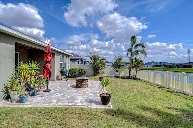 11605 Cleyera Ct, Riverview, FL 33579 - view of yard featuring an outdoor fire pit, a patio, and a residential view