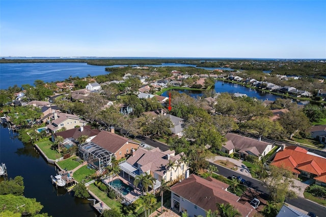 aerial view with a residential view and a water view