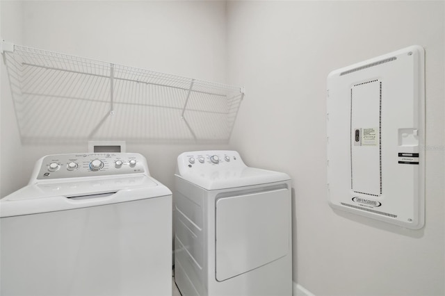 washroom featuring laundry area and washing machine and dryer