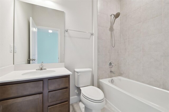 bathroom with shower / tub combination, vanity, and toilet