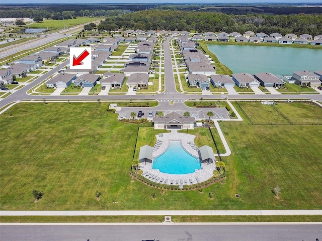 aerial view featuring a water view and a residential view