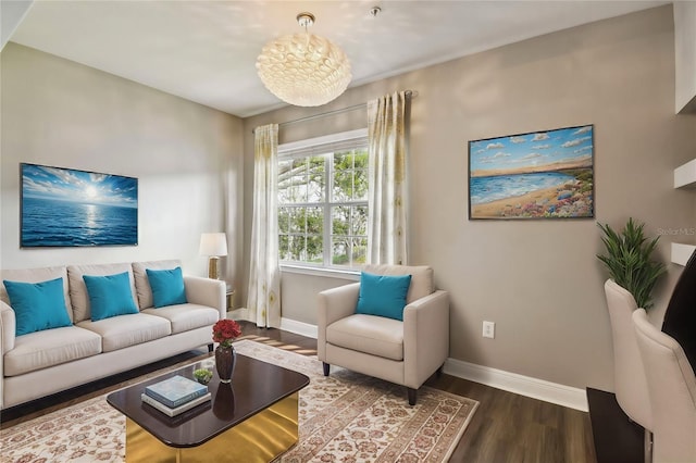 living area with dark wood-type flooring and baseboards