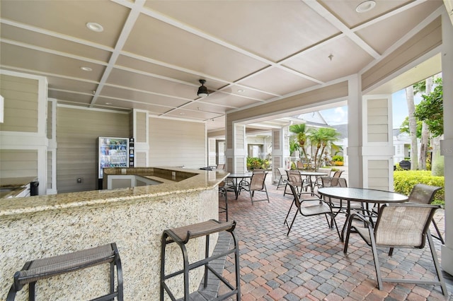 view of patio with a bar