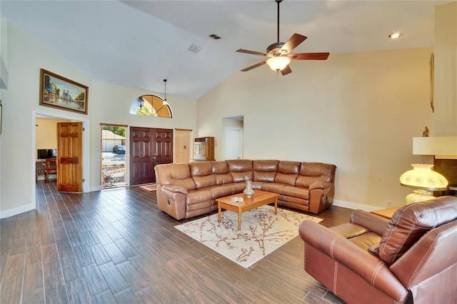 living room featuring ceiling fan, high vaulted ceiling, dark wood-style flooring, visible vents, and baseboards