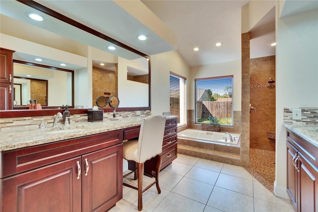 full bath with recessed lighting, vanity, a bath, walk in shower, and tile patterned floors