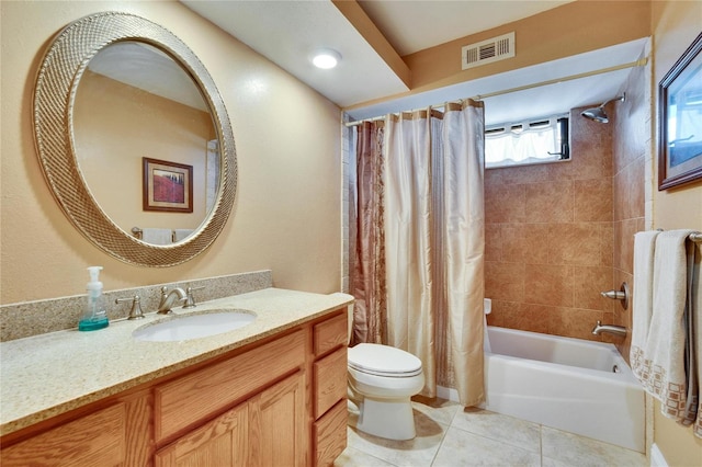 full bathroom featuring visible vents, toilet, shower / tub combo with curtain, tile patterned flooring, and vanity