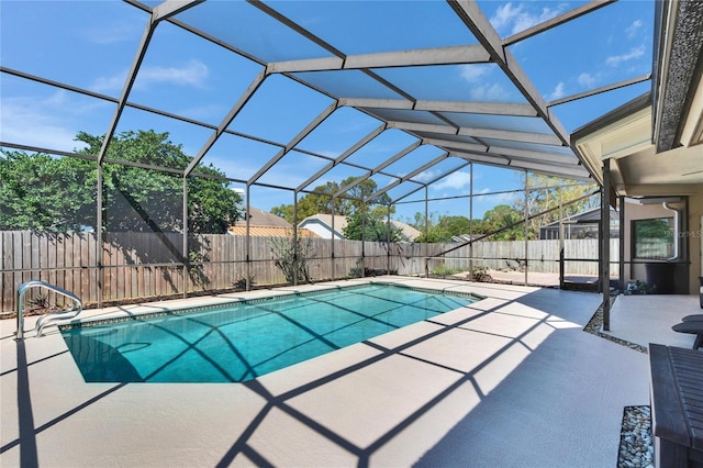 view of pool with a lanai, a patio area, a fenced backyard, and a fenced in pool