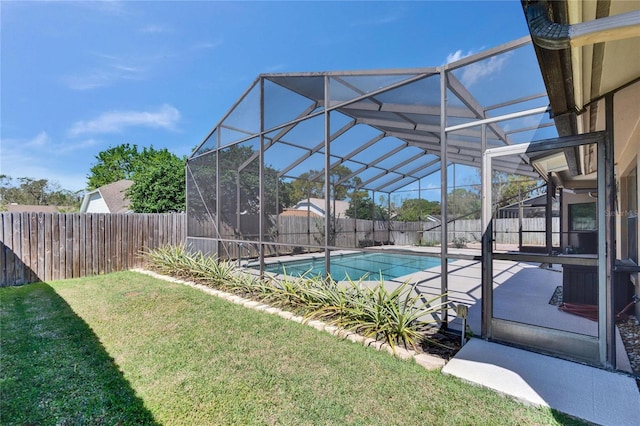 view of pool with a fenced in pool, a lawn, a fenced backyard, a lanai, and a patio area