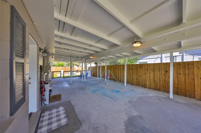 view of patio featuring fence