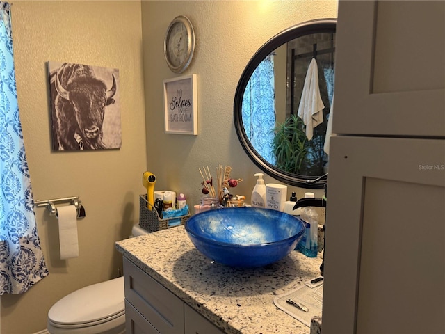 2069 Overbrook Ln, Spring Hill, FL 34606 - bathroom with vanity and toilet