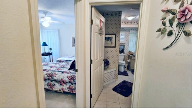 hall featuring tile patterned floors