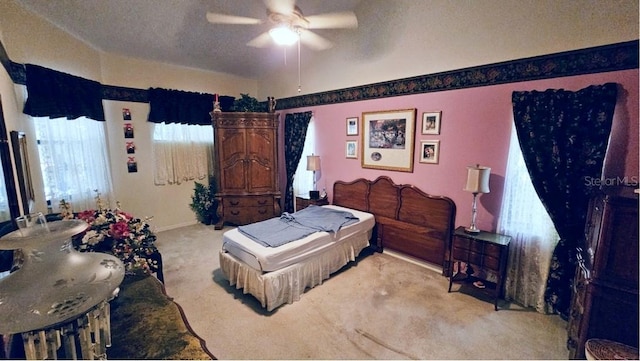 bedroom featuring carpet floors and a ceiling fan