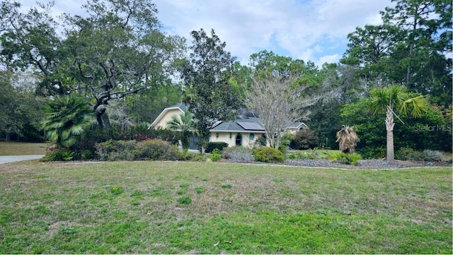 exterior space with a front yard