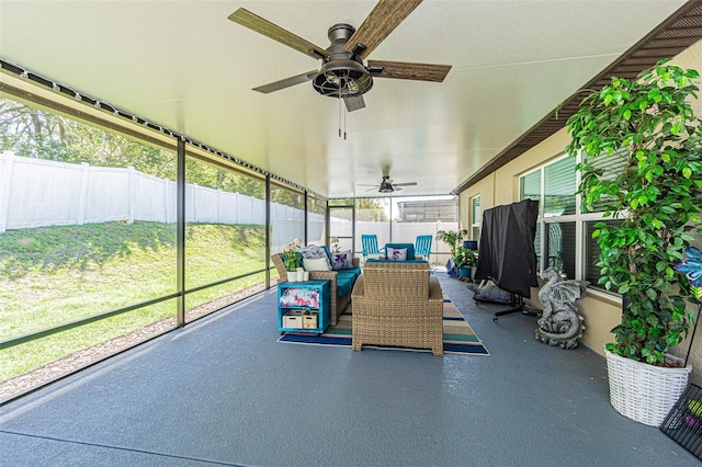 sunroom / solarium with ceiling fan