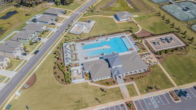 birds eye view of property with a residential view