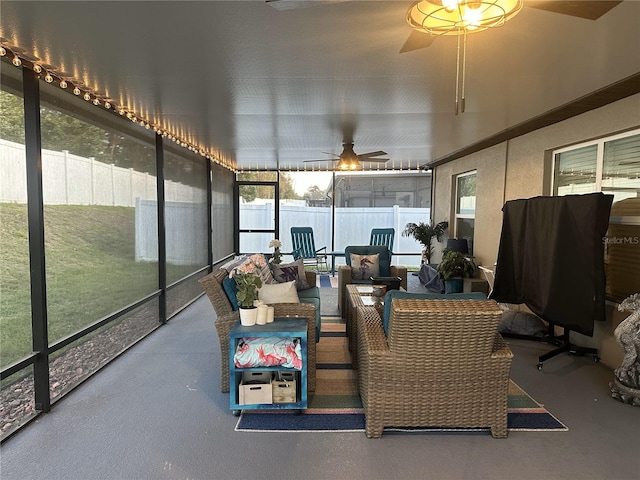 6494 Beverly Hills Dr, Zephyrhills, FL 33541 - sunroom featuring an outdoor hangout area and ceiling fan