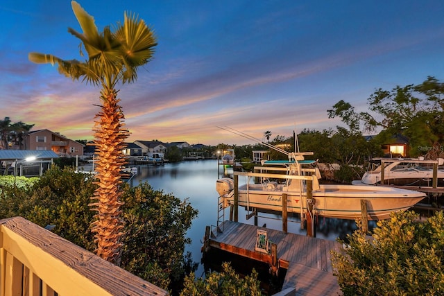 view of dock featuring a water view and boat lift