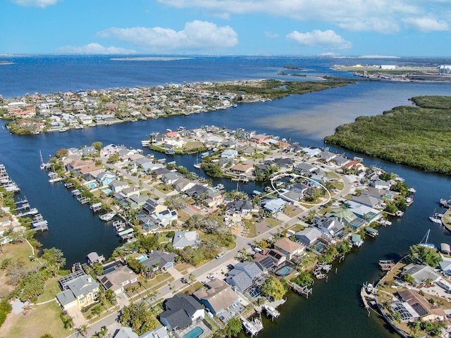 aerial view with a residential view and a water view