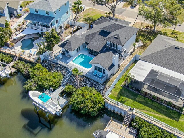 aerial view with a water view and a residential view