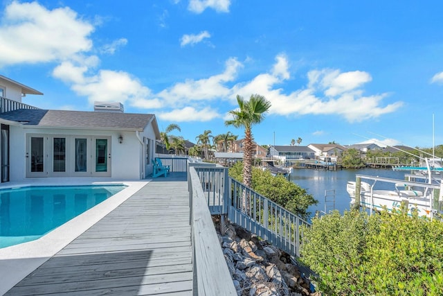 6606 Dolphin Cove Dr, Apollo Beach, FL 33572 - view of pool with a water view and a residential view