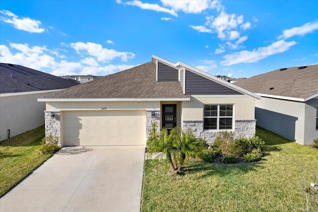 view of front of house with a front lawn, concrete driveway, stucco siding, a garage, and stone siding