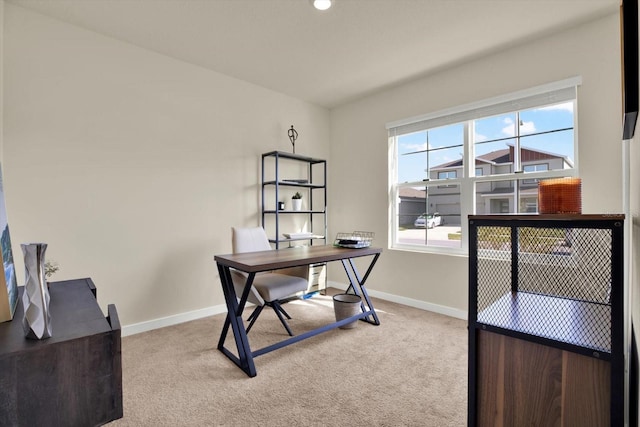 office area with baseboards and carpet floors