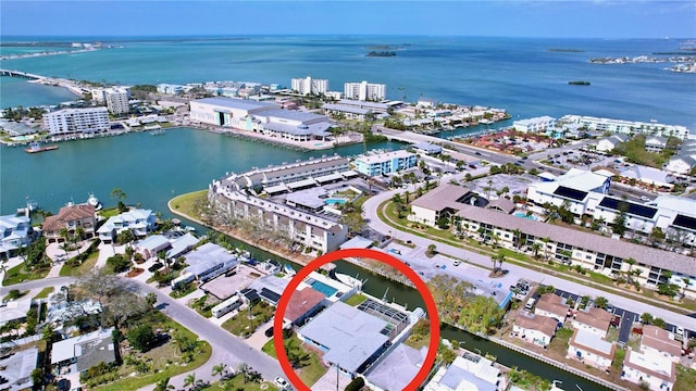 birds eye view of property featuring a water view