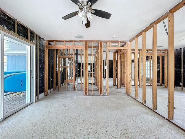 misc room featuring a ceiling fan and visible vents