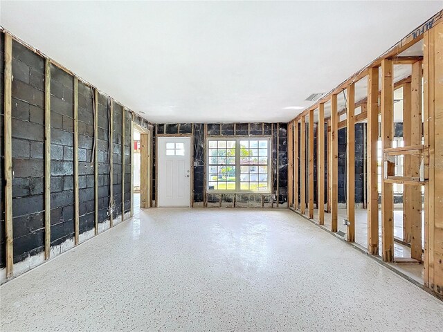 empty room featuring speckled floor