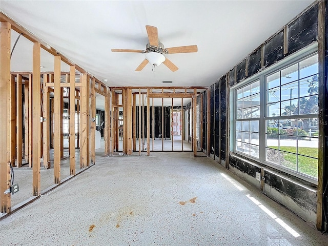 spare room with ceiling fan and visible vents