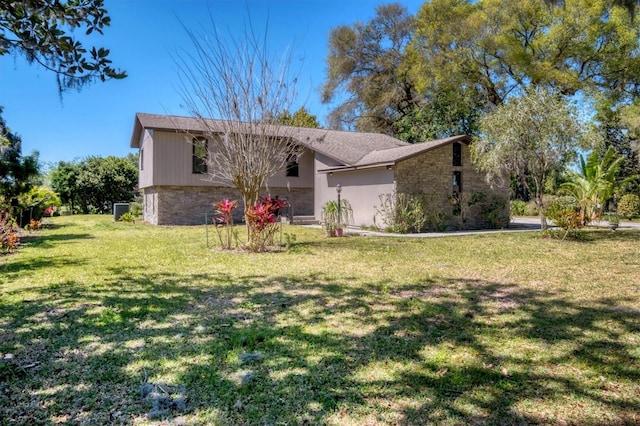 view of front of house with a front lawn