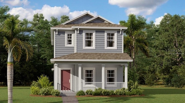 view of front facade featuring a front lawn, a porch, board and batten siding, and roof with shingles