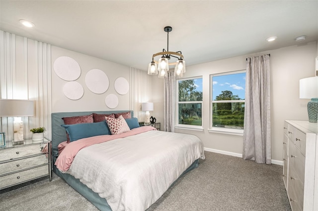 bedroom with a notable chandelier, baseboards, carpet flooring, and recessed lighting