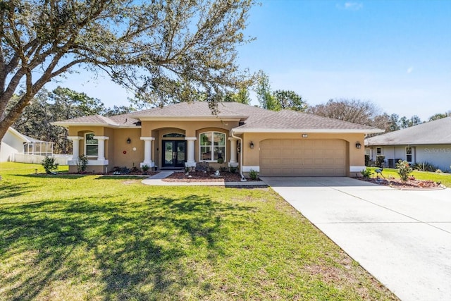 ranch-style home featuring french doors, stucco siding, an attached garage, driveway, and a front lawn