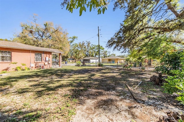 view of yard with fence