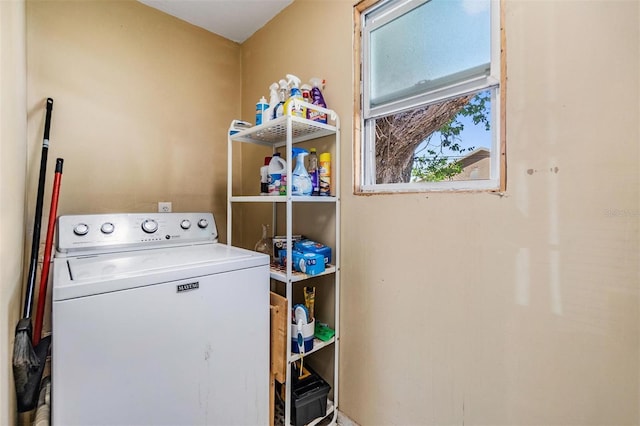 laundry room featuring washer / dryer and laundry area